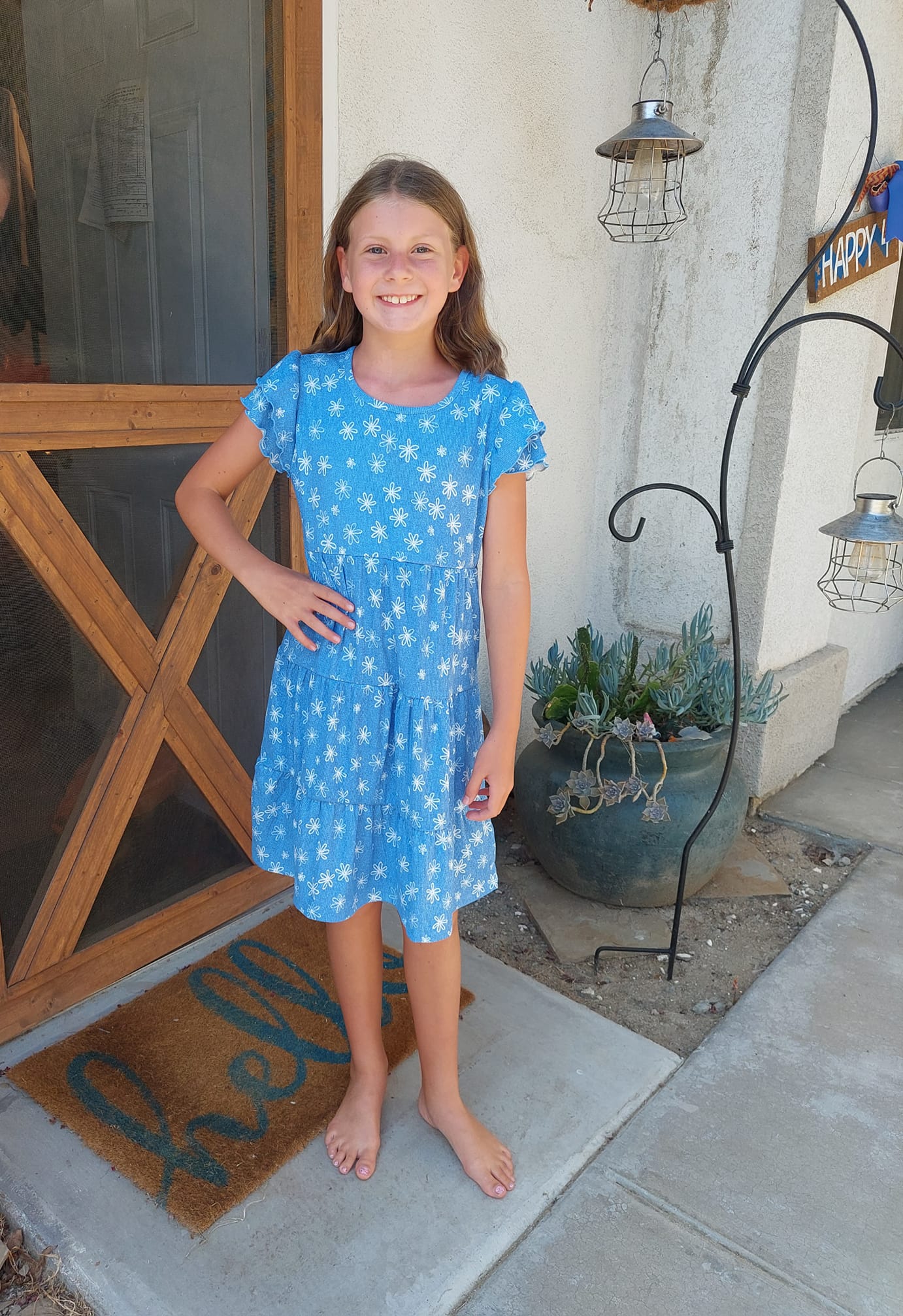 MOLLY KIDS RUFFLE DRESS - BLUE WITH WHITE FLOWER